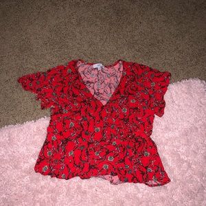 red floral blouse
